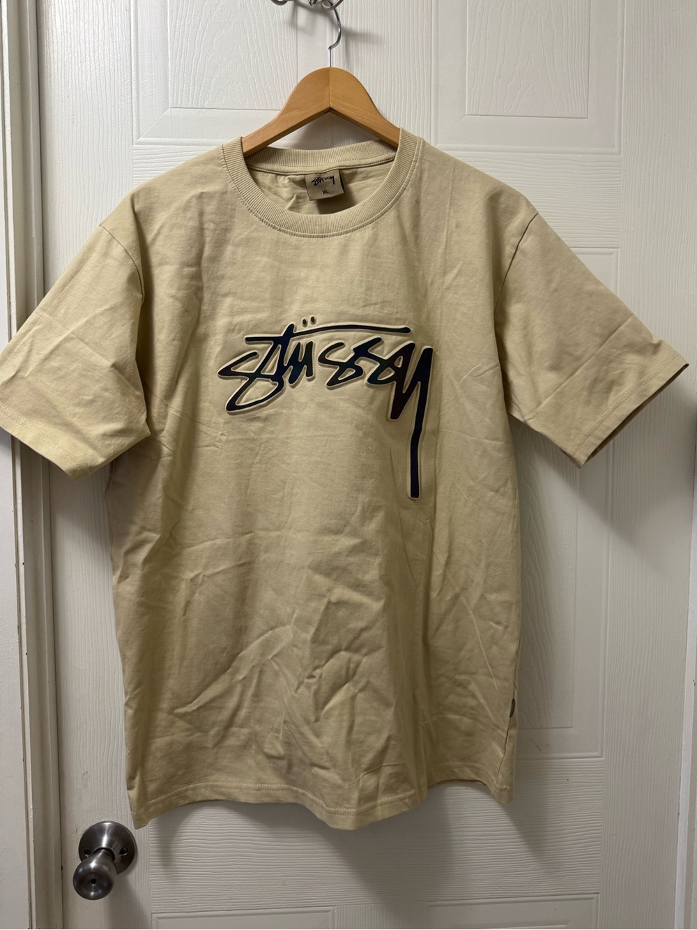 Stussy Beige Short Sleeve Tee with Black Script Logo